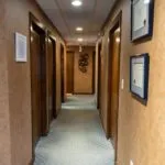 Picturing depicting the hallway to other rooms in the Zeal Dental office